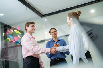 Business meeting highlights teamwork and collaboration in modern office setting
