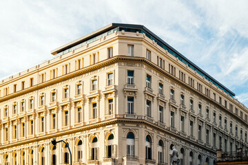 Corner view of a historic colonial building in Havana, Cuba, with deep architectural perspective,...
