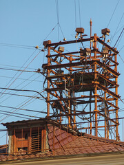 cable tower on the roof of an old house