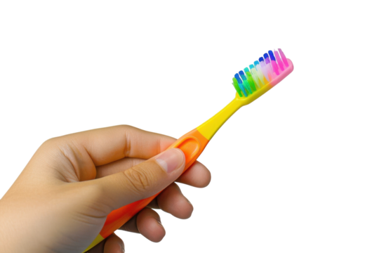 A vibrant handheld toothbrush with colorful bristles, showcasing dental care and hygiene in a bright setting isolated on transparent background
