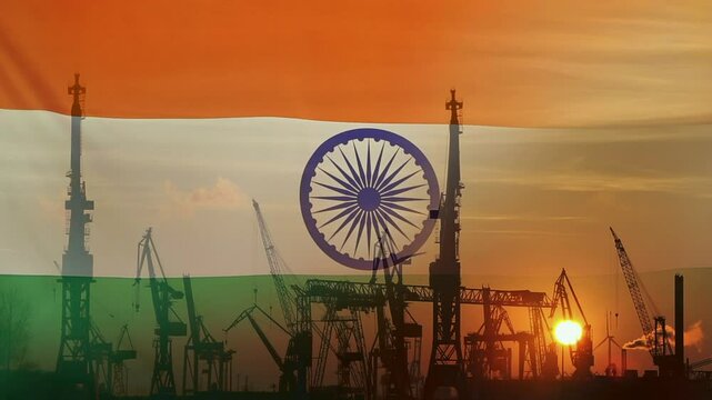 Industrial concept with India flag at sunset, silhouette of container harbor