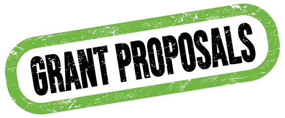 GRANT PROPOSALS, text written on green-black stamp sign.