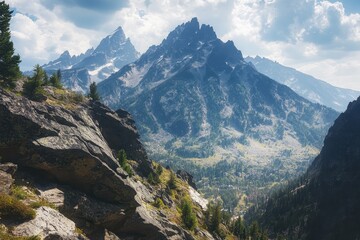 Naklejka premium Cliff Ledge at Grand Teton National Park: Rock Climber on Granite Cliff Overlooking Cascade Canyon