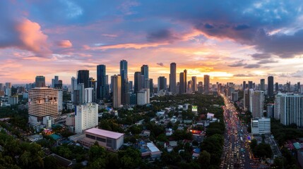Fototapeta premium Aerial Sunset View of City Skyline with Busy Road