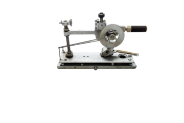 An intricate drafting tool rests on technical blueprints, showcasing precision design in a sunlit workspace isolated on transparent background