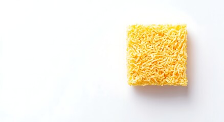 A top-down view of instant noodles, isolated on white background