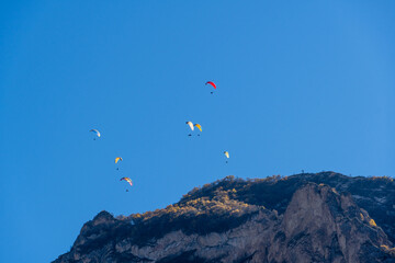 Paragliders enjoy of magnificent mountain landscapes from bird's eye view. Fly Chegem paragliding site in Chegem Gorge is new 
