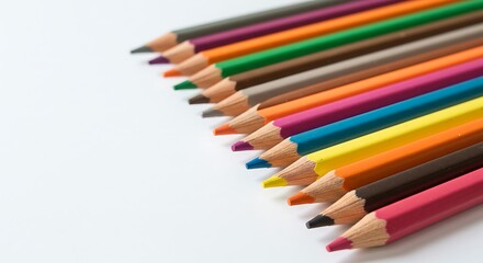 Fototapeta premium Colorful Pencils Arranged on White Background Art Supplies Close Up View