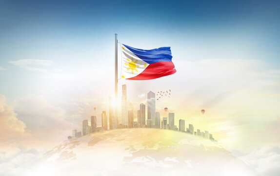 Philippines flag wavering on globe with modern building skyline. Flag waving on world map. Philippines national flag for independence day.