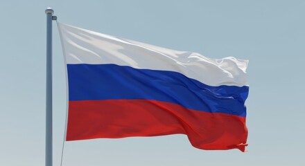 Fototapeta premium Russian Federation Flag Waving Proudly Against a Clear Blue Sky