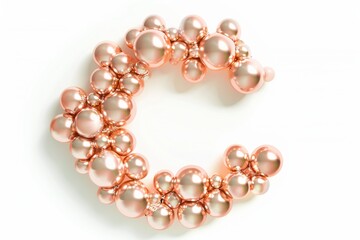 Obraz premium A whimsical arrangement of pink pearls forms the letter C, beautifully accentuating creativity and elegance in a minimalist design isolated on transparent background