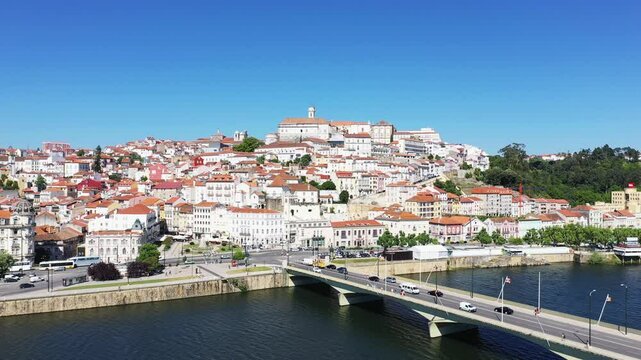 The Mondego River flows across Coimbra, in Europe, in Portugal, in the Center, in summer, on a sunny day.&nbsp;