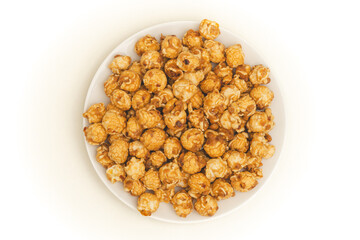 a bowl of Caramel Popcorn isolated on white