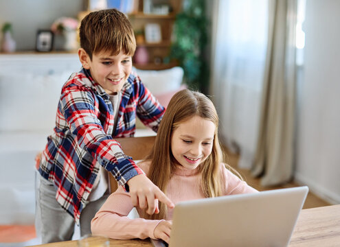 child girl boy childhood kid brother sister laptop computer tablet education technology homework school study learning student elearning - Powered by Adobe