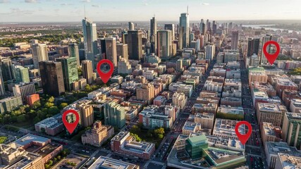 Aerial view of American city with appearing GPS pins, urban navigation concept, morning light, video with copy space