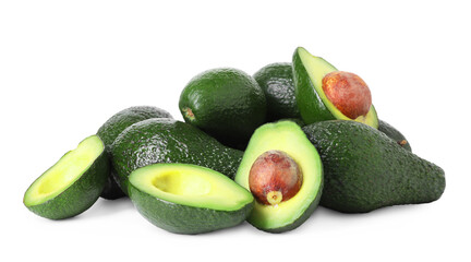 Many whole and cut avocados isolated on white
