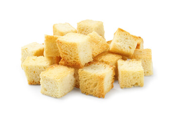 Many delicious crispy croutons isolated on white