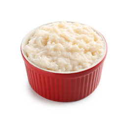 Delicious rice pudding in bowl isolated on white