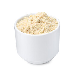 Superfood product. Sesame seeds powder in bowl isolated on white