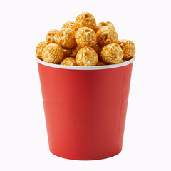 Sweet caramel glazed popcorn balls in a red paper cup - isolated on white