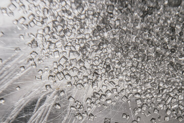 Synthetic white crystals resembling drugs – chemical substances, forensic science, and illegal drug production concept