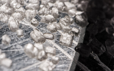 Synthetic white crystals resembling drugs – chemical substances, forensic science, and illegal drug production concept