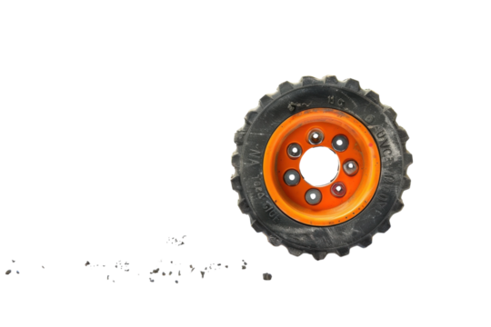A bright orange toy truck tire on a ruler measures the cracked surface below it during midday isolated on transparent background