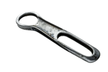 A close-up look at a shiny metal tool resting on a smooth, reflective surface in soft lighting isolated on transparent background