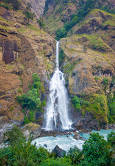Himalayas, Nepal - The famous hiking on the roof of the world called Annapurna Circuit in the Himalaya range mountain, with little village, buddhist stupa and mountains of 8000 meters.