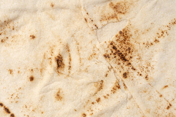 Thin lavash isolated on white background. Armenian unleavened lavash. Lavash as textured bread background.
