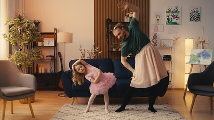 Little girl in tutu dress and her dad stretching and warming up before dancing