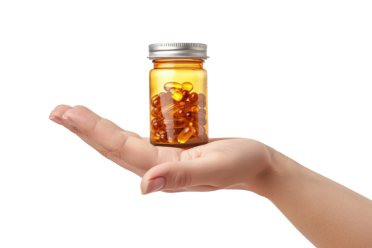 Hand holding an amber bottle of vitamins against a bright background conveying health and wellness isolated on transparent background