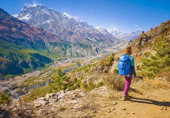 Fototapeta premium Himalayas, Nepal - The famous hiking on the roof of the world called Annapurna Circuit in the Himalaya range mountain, with little village, buddhist stupa and mountains of 8000 meters.