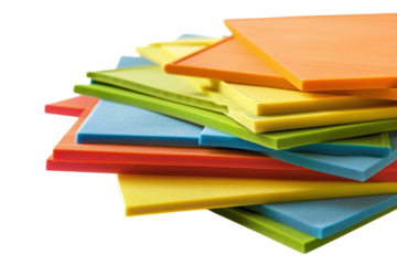 Colorful stack of textured foam sheets arranged artistically on a bright white background isolated on transparent background