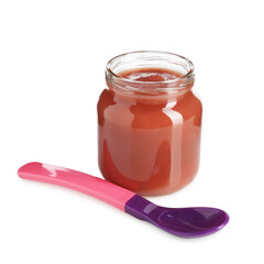 Baby food. Tasty puree in glass jar and spoon isolated on white