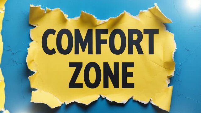 Message about comfort zone on a piece of torn paper with a blue backdrop.