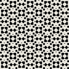 Geometric floral pattern in black and white. Repeated and decorative design that can be used for packaging, decorating, interior design, wallpapers, and more.