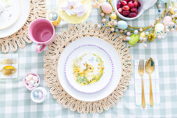 easter table setting with bunny plate