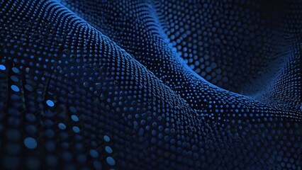 A blue abstract backdrop design features a halftone dot pattern with light waves