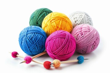 Vibrant collection of colorful yarn balls with playful pom-pom sticks in bright daylight setting isolated on transparent background