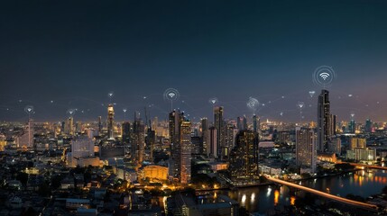 Fototapeta premium Aerial panorama of smart city at night with icons Internet of Things networks and augmented reality technology concept