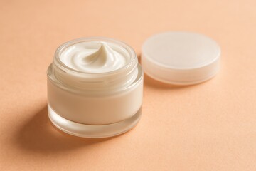 Cream in Clear Container on Peach Surface Highlighting Beauty Products Texture and Quality