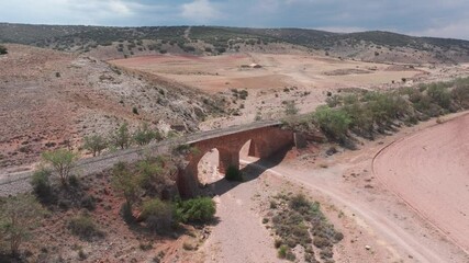 Drone shot of old train bridge in aragon spain