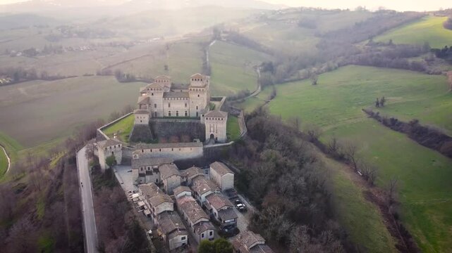 Torrechiara Castle in San Lorenzo Parma, with nice sunset on the background.