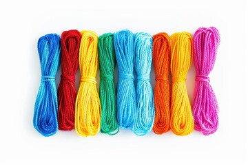 Vibrant assortment of colorful yarn bundles arranged harmoniously on a bright background isolated on transparent background