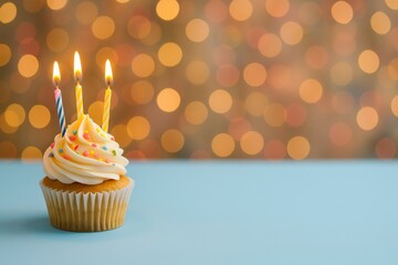 Celebrating a Special Occasion With a Festive Cupcake Adorned With Candles and Sprinkles