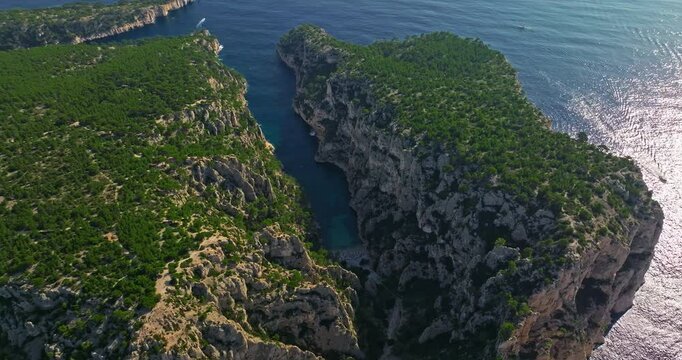 Aerial View of Calanque dEn-Vau near cassis town provence France. Breathtaking view of bay, a beautiful blue lagoon with a white sand beach, surrounded by cliffs, pines, near Marseille in France