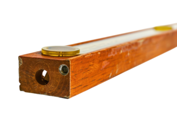 Craftsmanship in focus with an elegant wooden level tool resting on a clean white surface isolated on transparent background