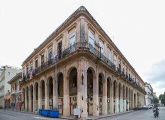 Colorful Colonial Buildings in Havana, Cuba.
Pastel-colored colonial facades in Old Havana with balconies and shuttered windows, captured in soft morning light.
