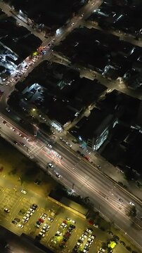 Itaquera neighborhood in S&atilde;o Paulo at night. Aerial view. Vertical video.